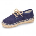 Laces up espadrille shoes in washing effect cotton canvas.