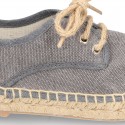 Laces up espadrille shoes in washing effect cotton canvas.