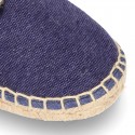 Laces up espadrille shoes in washing effect cotton canvas.