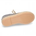 Laces up espadrille shoes in washing effect cotton canvas.