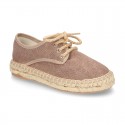 Laces up espadrille shoes in washing effect cotton canvas.