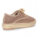 Laces up espadrille shoes in washing effect cotton canvas.