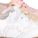 Classic soft nappa leather Laces up shoes in pastel colors.