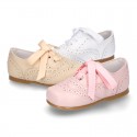 Classic soft nappa leather Laces up shoes in pastel colors.