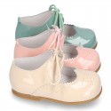 Little Mary jane shoes angel style in patent leather in pastel colors.