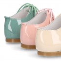 Little Mary jane shoes angel style in patent leather in pastel colors.