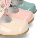 Little Mary jane shoes angel style in patent leather in pastel colors.