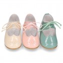 Little Mary jane shoes angel style in patent leather in pastel colors.