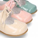 Little Mary jane shoes angel style in patent leather in pastel colors.