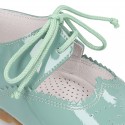 Little Mary jane shoes angel style in patent leather in pastel colors.