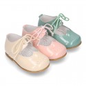 Little Mary jane shoes angel style in patent leather in pastel colors.