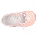 Little Mary jane shoes angel style in patent leather in pastel colors.