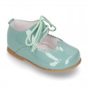 Little Mary jane shoes angel style in patent leather in pastel colors.