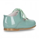 Little Mary jane shoes angel style in patent leather in pastel colors.