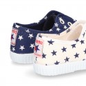 Cotton Canvas sneakers with STARS print, elastic bands and rubber toe cap.