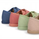 New Canvas Sneaker with toe cap and double velcro strap.
