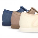 New Cotton canvas T-Strap shoes with toe cap and velcro strap.