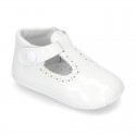 New T-Strap shoes for babies with Velcro strap, button and waves design in patent leather.