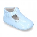 New T-Strap shoes for babies with Velcro strap, button and waves design in patent leather.