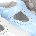 New T-Strap shoes for babies with Velcro strap, button and waves design in patent leather.