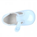 New T-Strap shoes for babies with Velcro strap, button and waves design in patent leather.