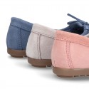 Indian style Moccasin shoes with bows in suede leather for girls.