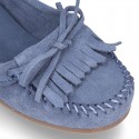 Indian style Moccasin shoes with bows in suede leather for girls.