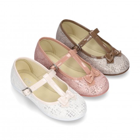 Cotton canvas T-strap Mary Jane shoes with shiny and patent effects.