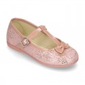 Cotton canvas T-strap Mary Jane shoes with shiny and patent effects.