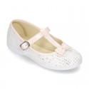 Cotton canvas T-strap Mary Jane shoes with shiny and patent effects.