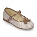 Cotton canvas T-strap Mary Jane shoes with shiny and patent effects.