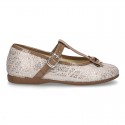 Cotton canvas T-strap Mary Jane shoes with shiny and patent effects.