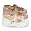 Cotton canvas T-strap Mary Jane shoes with shiny and patent effects.