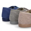 Wash effect cotton canvas laces up shoes for kids.