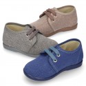 Wash effect cotton canvas laces up shoes for kids.