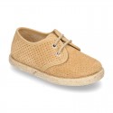 Laces up shoes espadrille style in suede leather little dots effect.