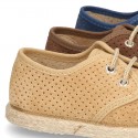 Laces up shoes espadrille style in suede leather little dots effect.