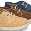 Laces up shoes espadrille style in suede leather little dots effect.