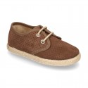 Laces up shoes espadrille style in suede leather little dots effect.