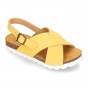 NUBUCK leather sandal shoes for toddler girls with crossed straps and white soles.