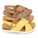 NUBUCK leather sandal shoes for toddler girls with crossed straps and white soles.