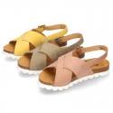 NUBUCK leather sandal shoes for toddler girls with crossed straps and white soles.