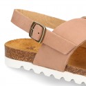 NUBUCK leather sandal shoes for toddler girls with crossed straps and white soles.