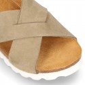 NUBUCK leather sandal shoes for toddler girls with crossed straps and white soles.