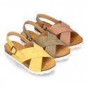 NUBUCK leather sandal shoes for toddler girls with crossed straps and white soles.