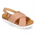 NUBUCK leather sandal shoes for toddler girls with crossed straps and white soles.