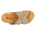 NUBUCK leather sandal shoes for toddler girls with crossed straps and white soles.