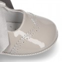 Classic Mary Jane shoes angel style for baby in patent leather with ties.