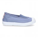 Cotton canvas kids Bamba type shoes with central elastic band and toe cap.