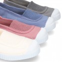 Cotton canvas kids Bamba type shoes with central elastic band and toe cap.